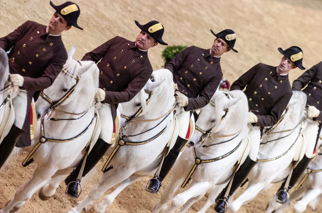 The Evolving Elegance of Dressage: A Journey from Military Uniforms to High-Performance Athletic Wear